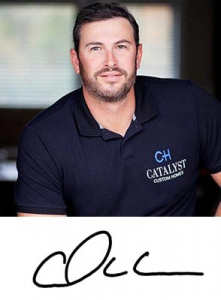 Portrait of a man in a navy CH Catalyst Custom Homes polo, shown from the chest up, with a signature beneath.